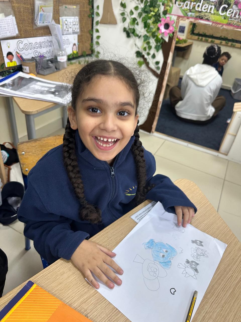 A child engaging in activities designed to prepare for school in Dubai's School Readiness Program.